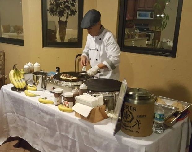 Chef making crepes live at an indoor event
